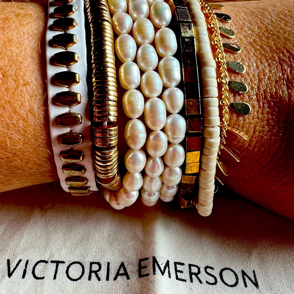 Victoria Emerson stacked bracelet gold tone and pearls.